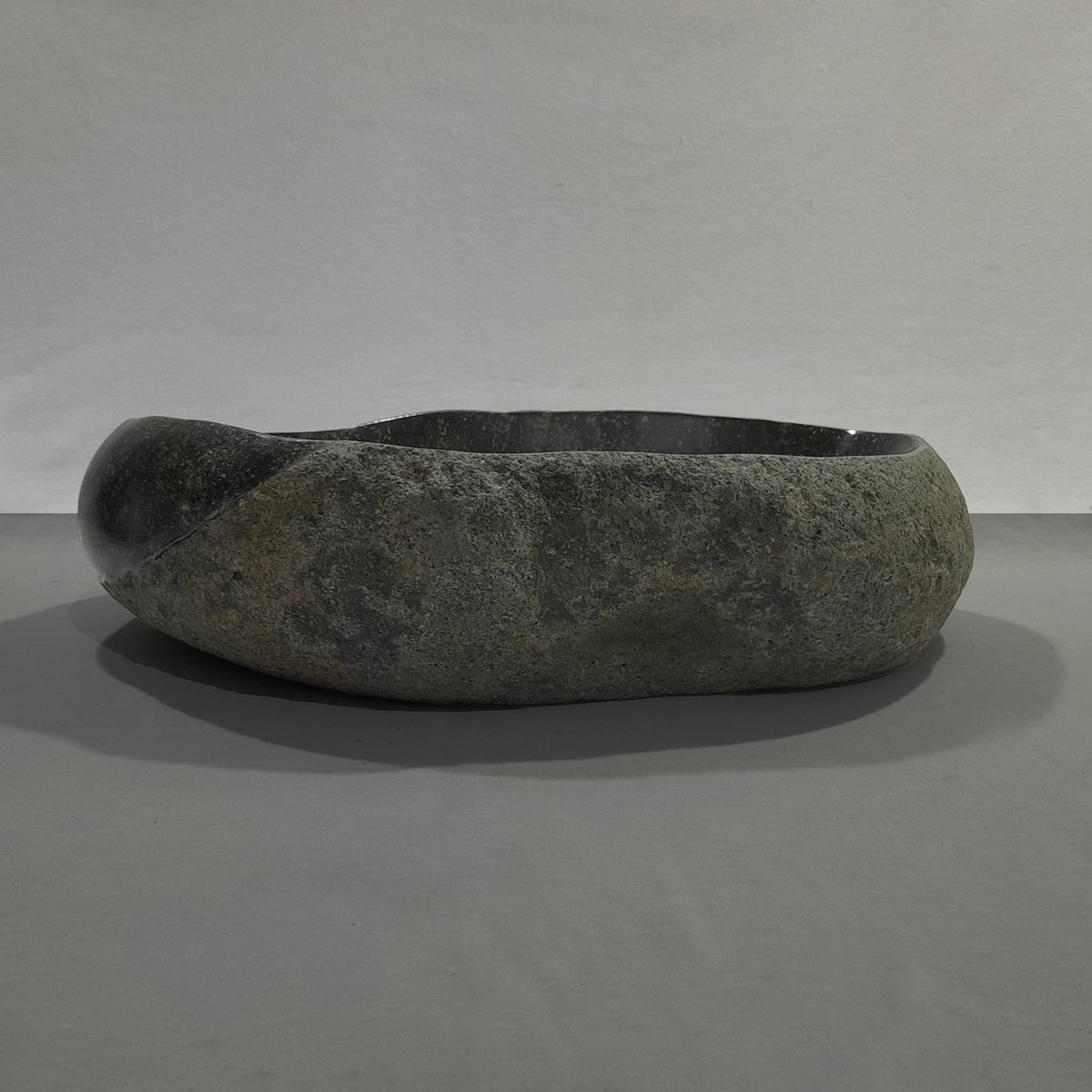 Natural stone sink on a gray background image 2 of 2