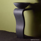 Wave Pedestal in honed basalt marble with the Urban Vessel sink.