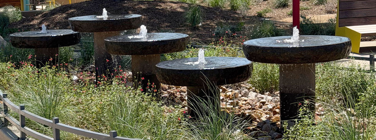 Five Custom natural millstones in different heights
