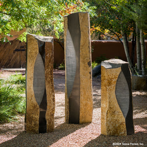 Sculptural Basalt Columns are each one-of-a-kind. These unique custom sculptural pieces can be ordered as shown or per your design. They are carved from natural basalt columns with ribbed, crescent-cut features. The hexagonal natural shape is finished with alternating polished and natural sides.  image 1 of 1
