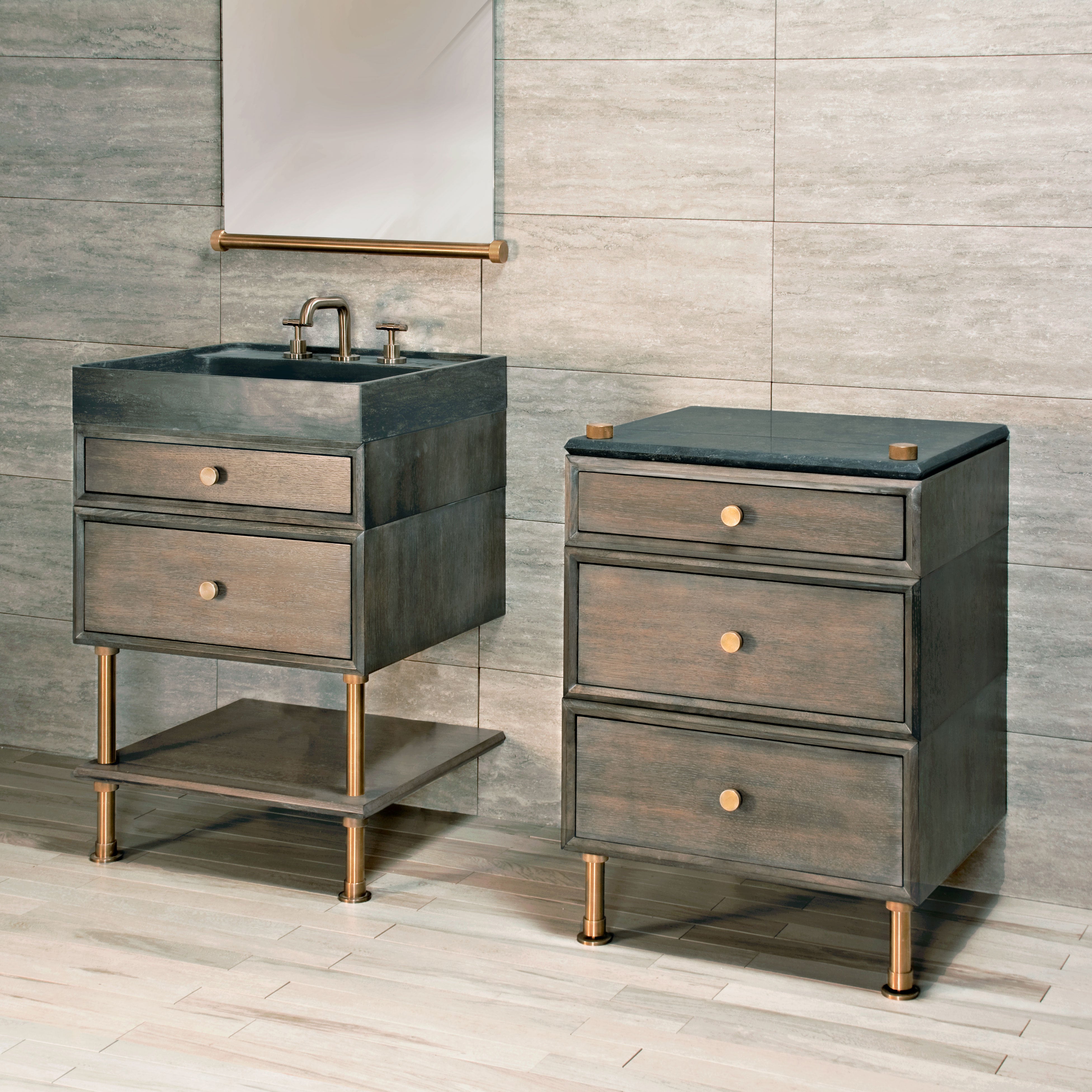 Stone Forest Elemental Classic Side Table in aged brass and antique gray limestone.  Elemental Classic Vanity with split drawers and Ventus Bathsink.