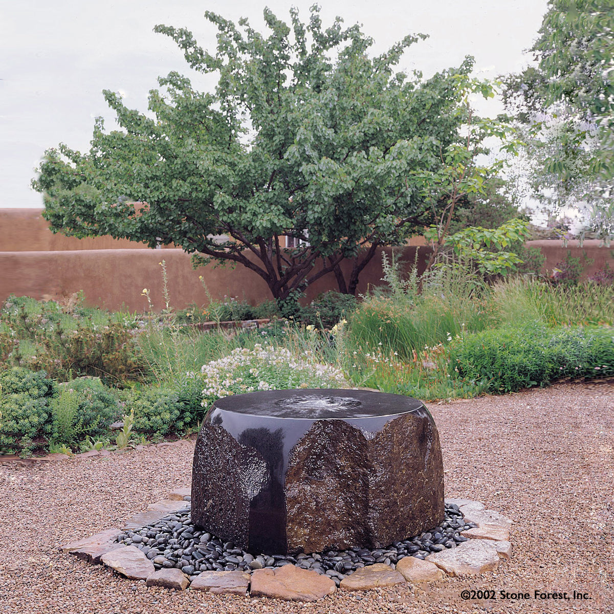 Stone Forest Garden fountain: Maru Fountain carved from basalt. image 2 of 2