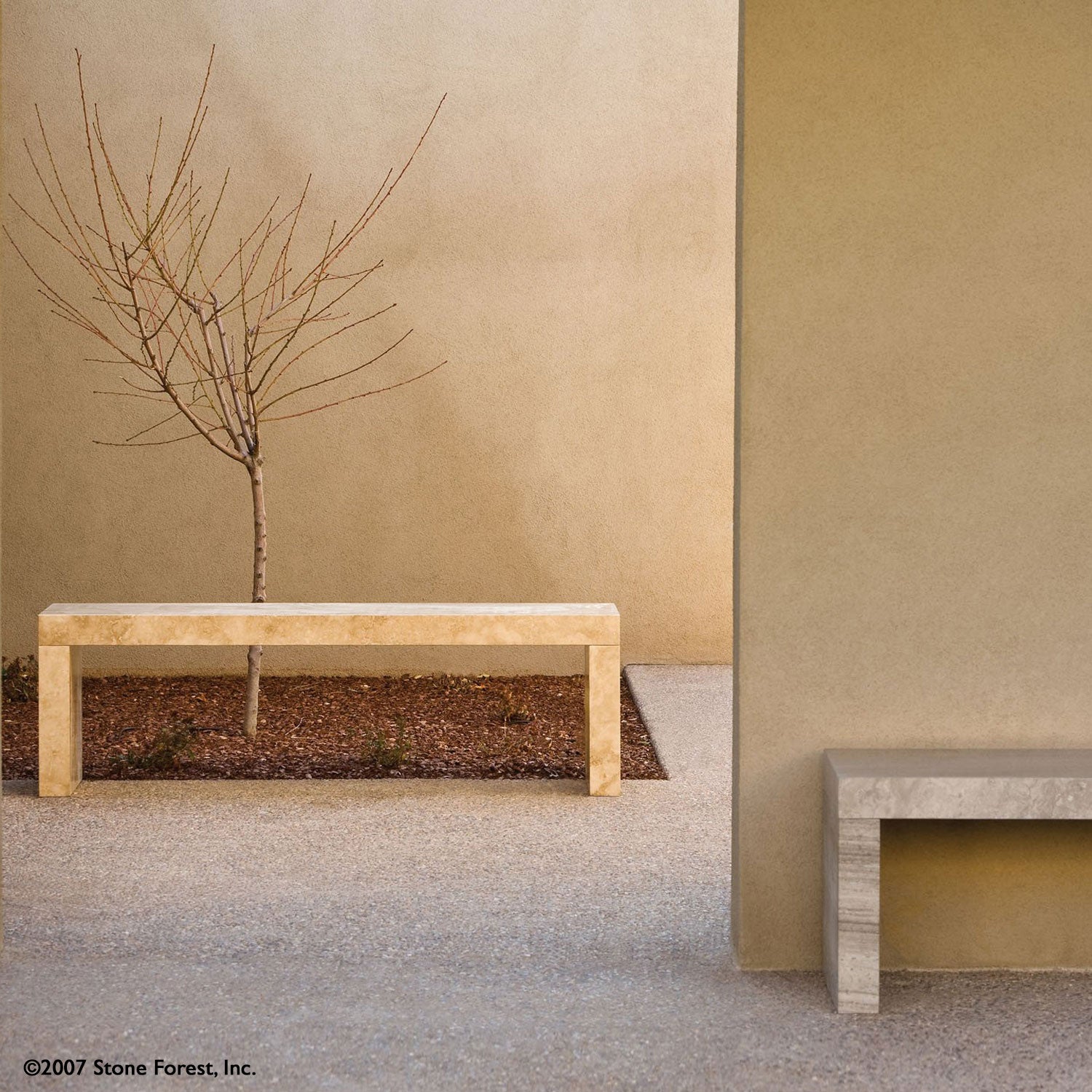 The Sierra Bench is a  contemporary piece made of three solid stone slabs joined together using mortise and tenon-style joints. Carved from Travertino Romano, which is a type of travertine, or Serpeggiante marble. 