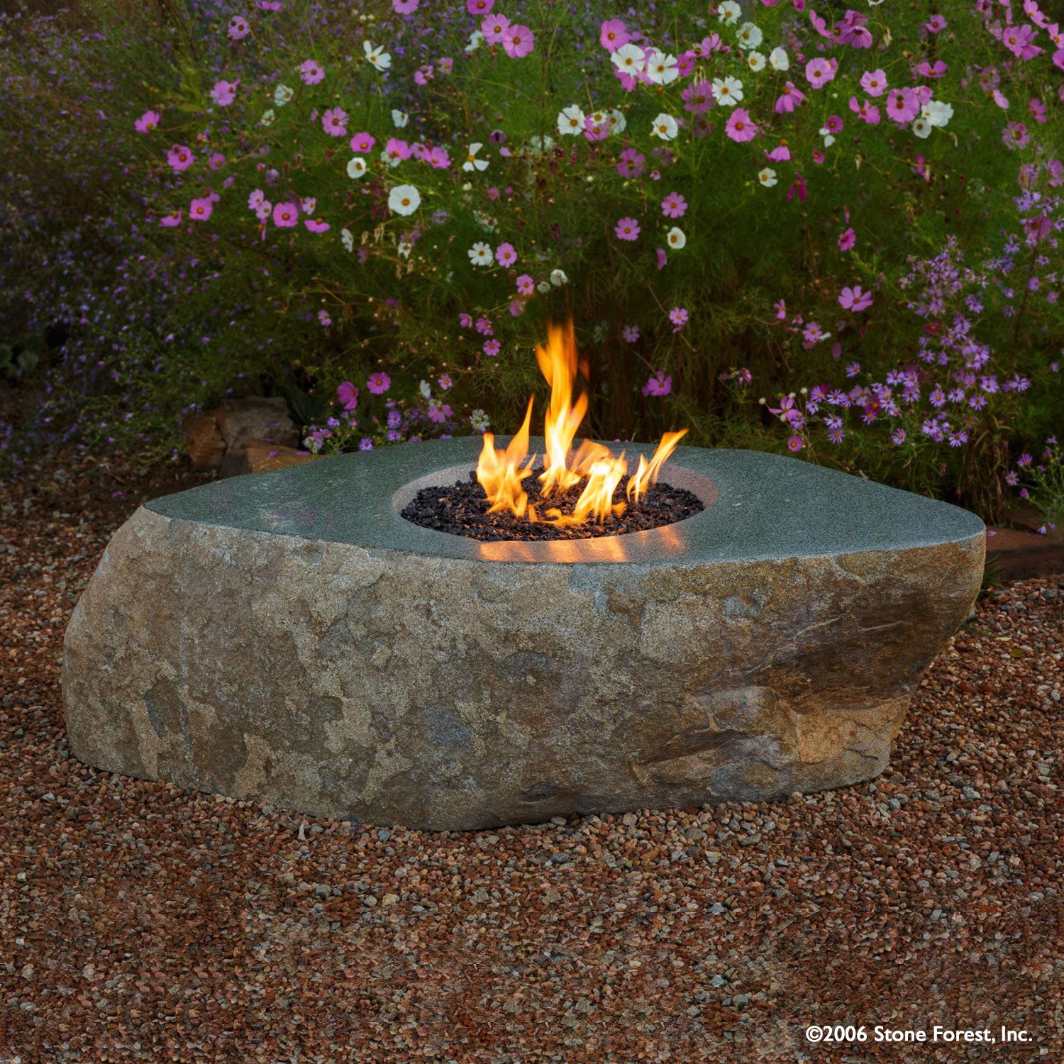 The Natural Fire Boulder is carved from a monolithic natural boulder