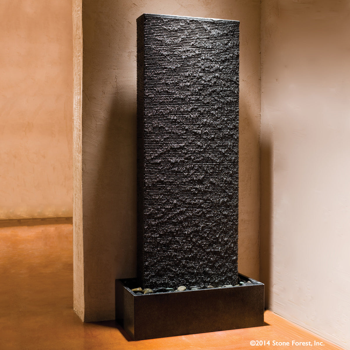 Stone Forest Ribbed Waterwall indoor fountain carved from grey granite. image 1 of 1