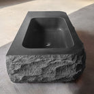 Custom Black granite Vanity sink with rough chiseled front and sides - top side view