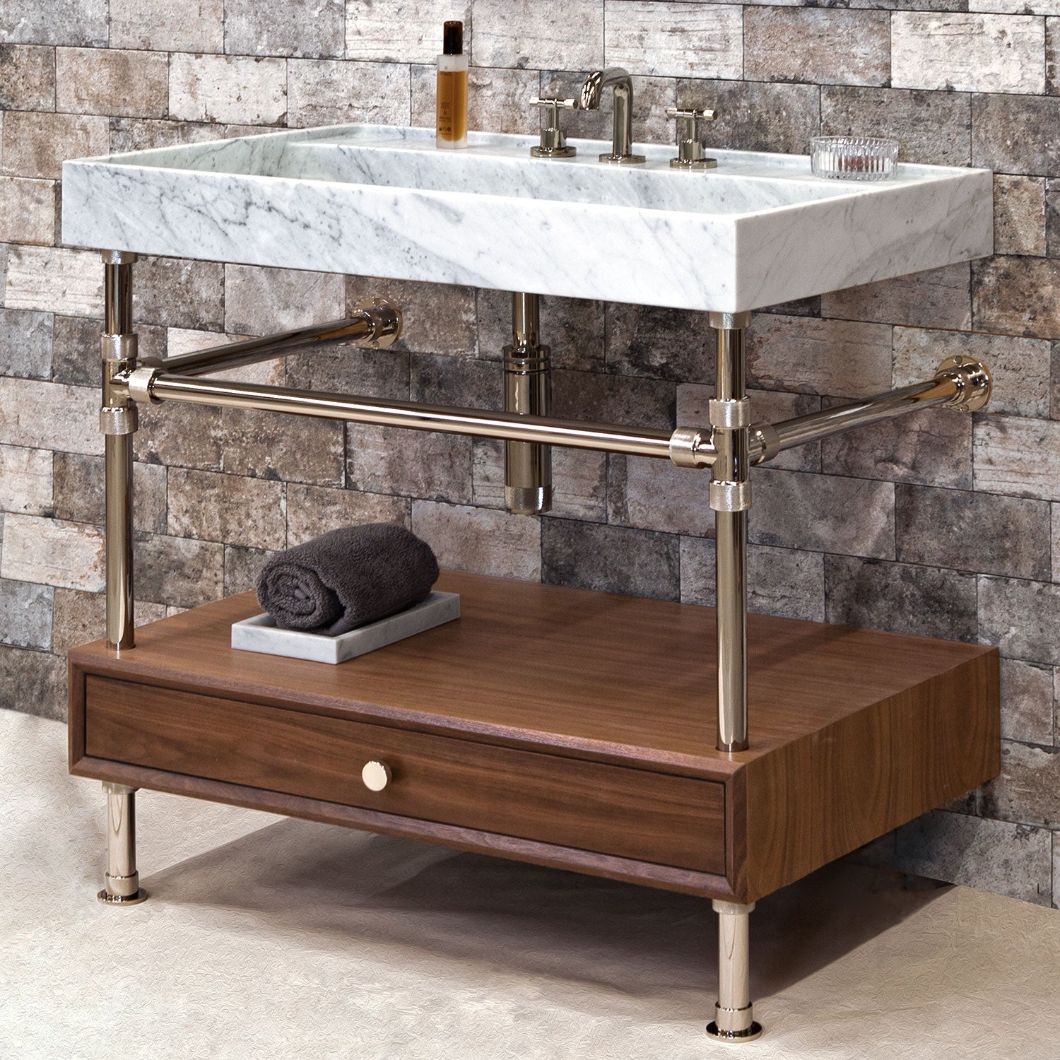 A bathroom vanity with a marble top, wooden base with a drawer, and metal leg supports.