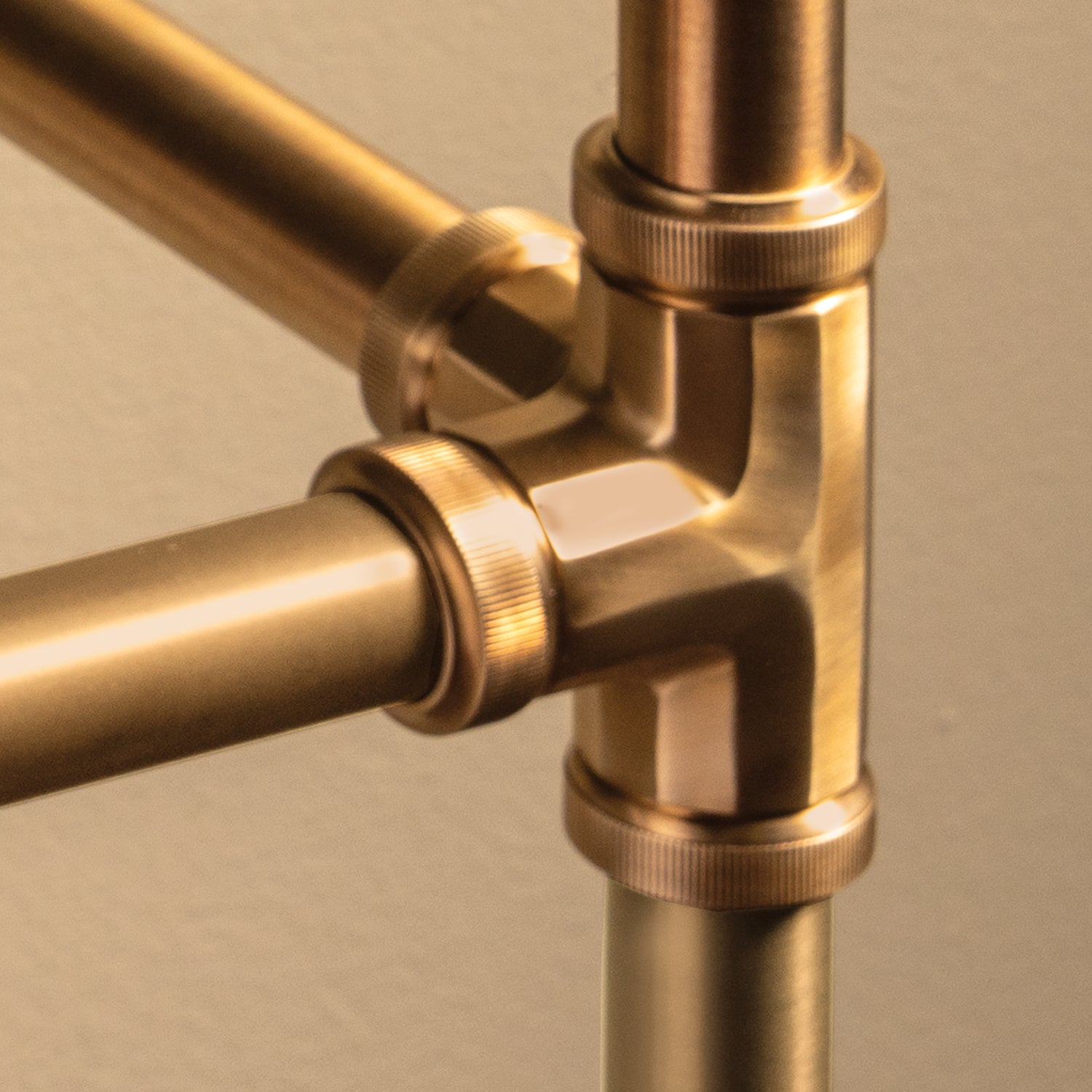 Detail of Aged Brass  Elemental  Facet Crossbar Stand