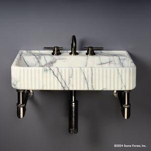 Fluted Lumbre Bath Sink carved from Viola Bianco Marble on an Elemental Facet Wall Unit in graphite image 2 of 4
