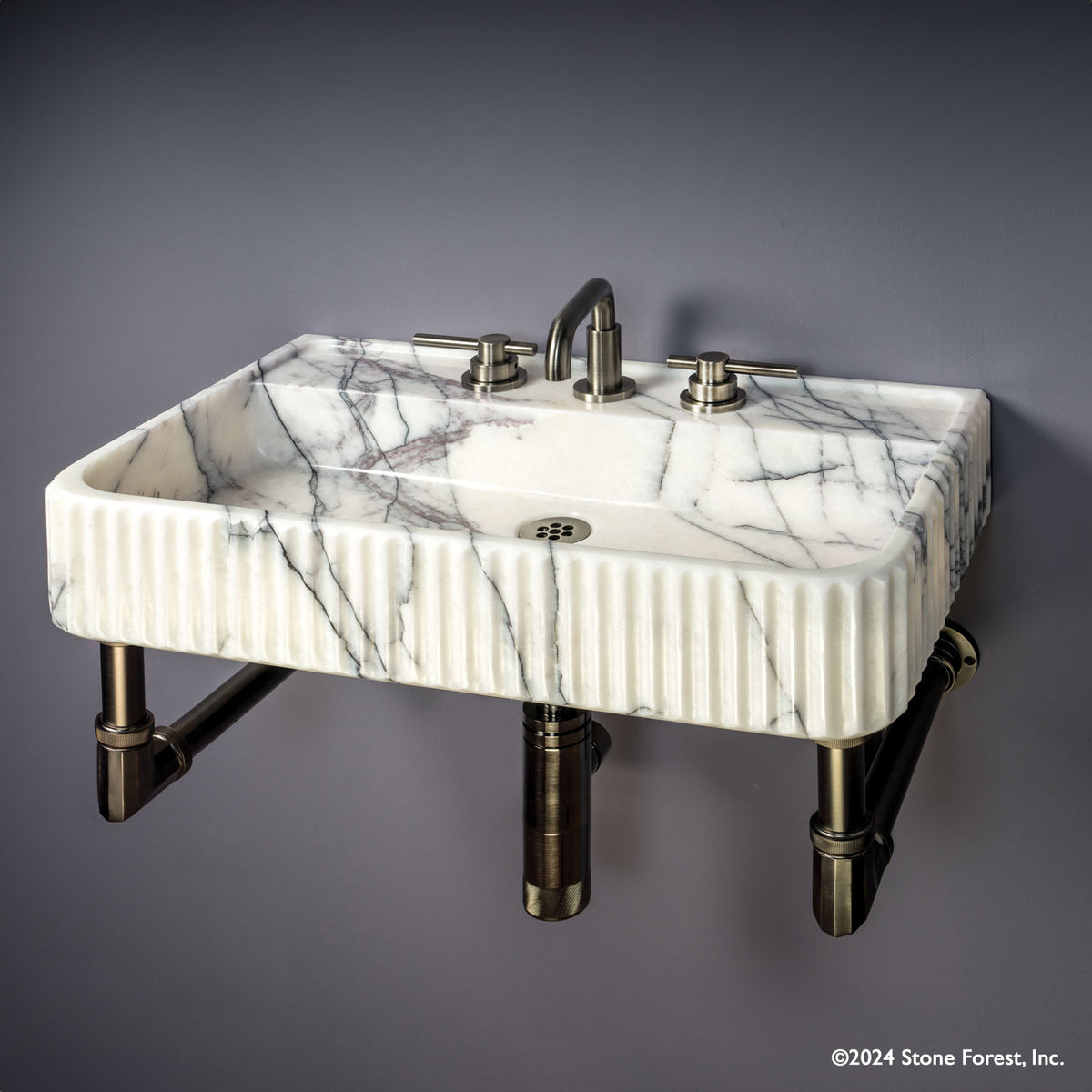 Fluted Lumbre Bath Sink carved from Viola Bianco Marble on an Elemental Facet Wall Unit in graphite image 1 of 4