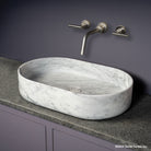 Oval Contour Vessel Bath Sink in carrara marble with drain cover