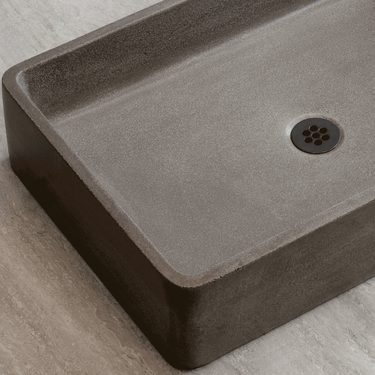 Close up Rectangular concrete sink on a light gray background image 3 of 3