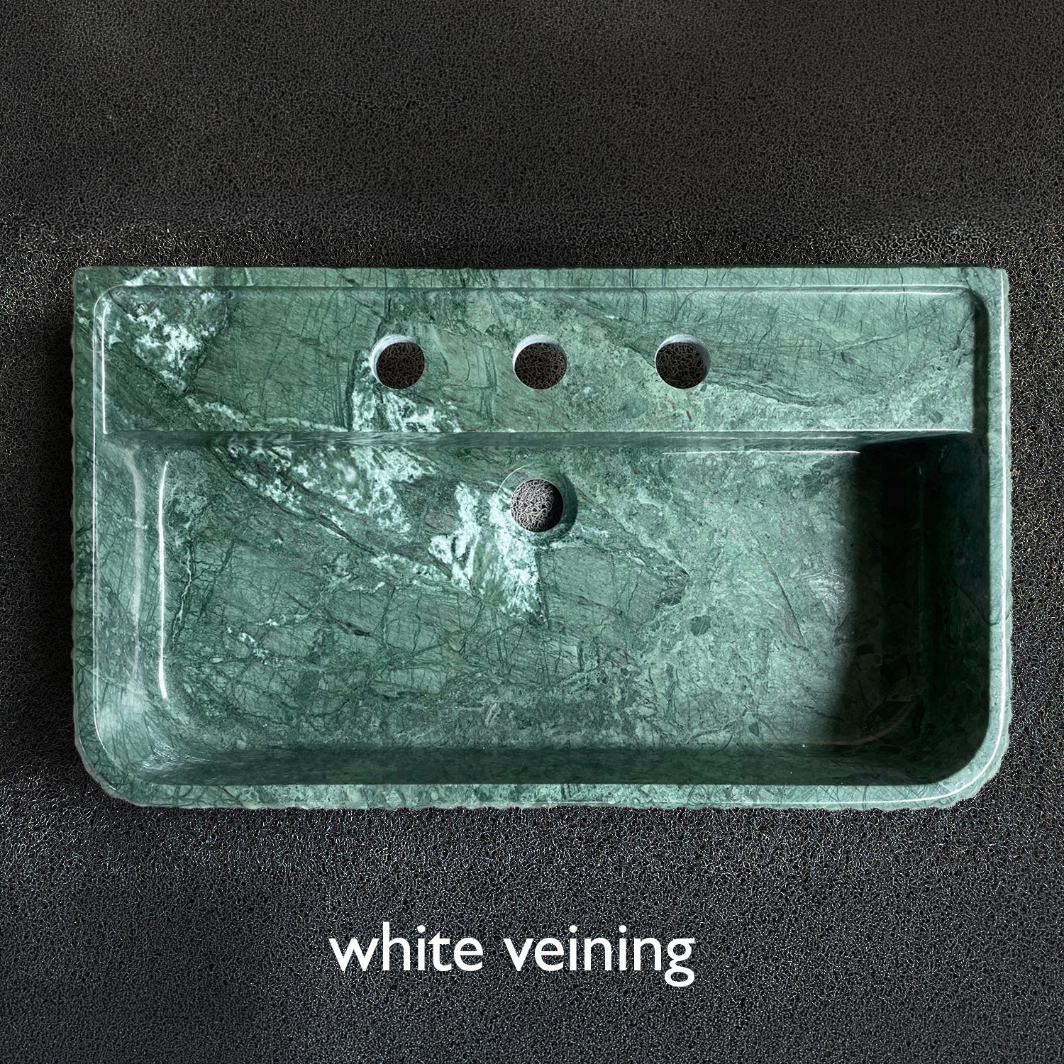 Fluted Lumbre in Verde Indio showing how it sometimes has white veining