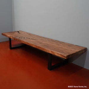 This massive wood bench is truly unique and is a one-of-a-kind piece. hand-made from a thick slab of Acacia hardwood supported by metal legs, image 1 of 4