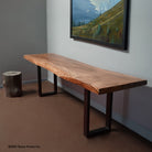 A rectangular Acacia hardwood console table with metal legs.