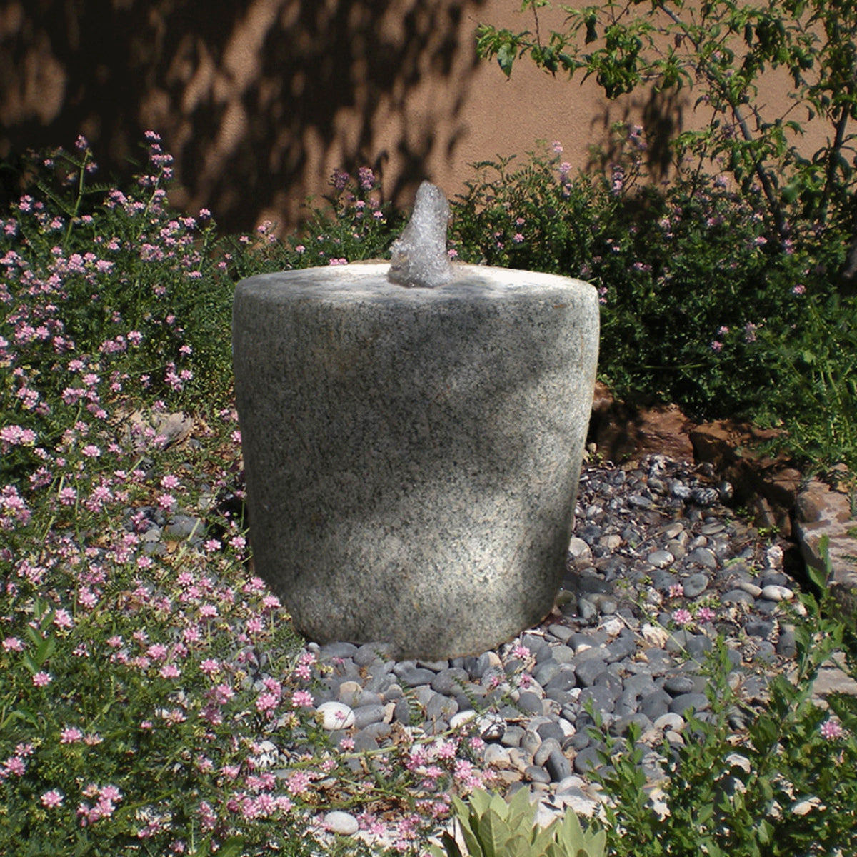 Stone Forest Antique Grindstone installed as garden fountain image 1 of 2