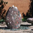 Stone Forest 48"h  Pebble garden fountain hand carved from natural stone