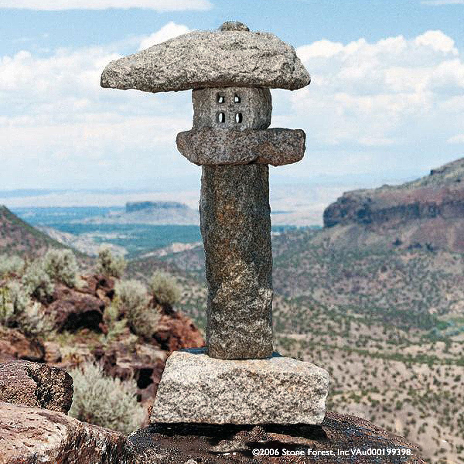 Stone Forest's original lantern is a rough carved interpretation of a tachi-gata (pedestal) style stone lantern. carved from black and white (salt and pepper) granite.