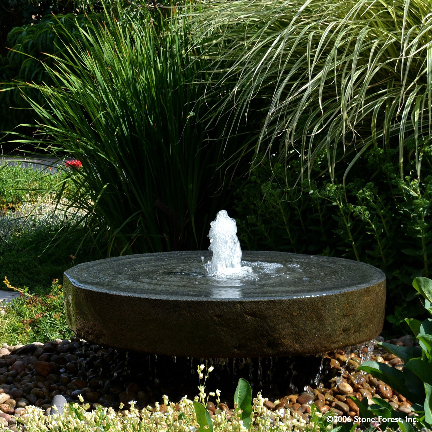 Stone Forest Natural Millstone garden fountain carved from  granite