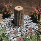Stone Forest Small Antique Grinding Stone carved from beige granite used as garden fountain
