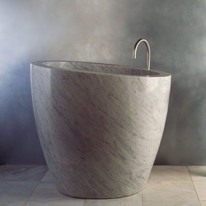 The free standing Stone Forest Eau Soaking Bathtub is hand-carved from a solid block of Carrara marble. Made on a custom basis. image 2 of 2