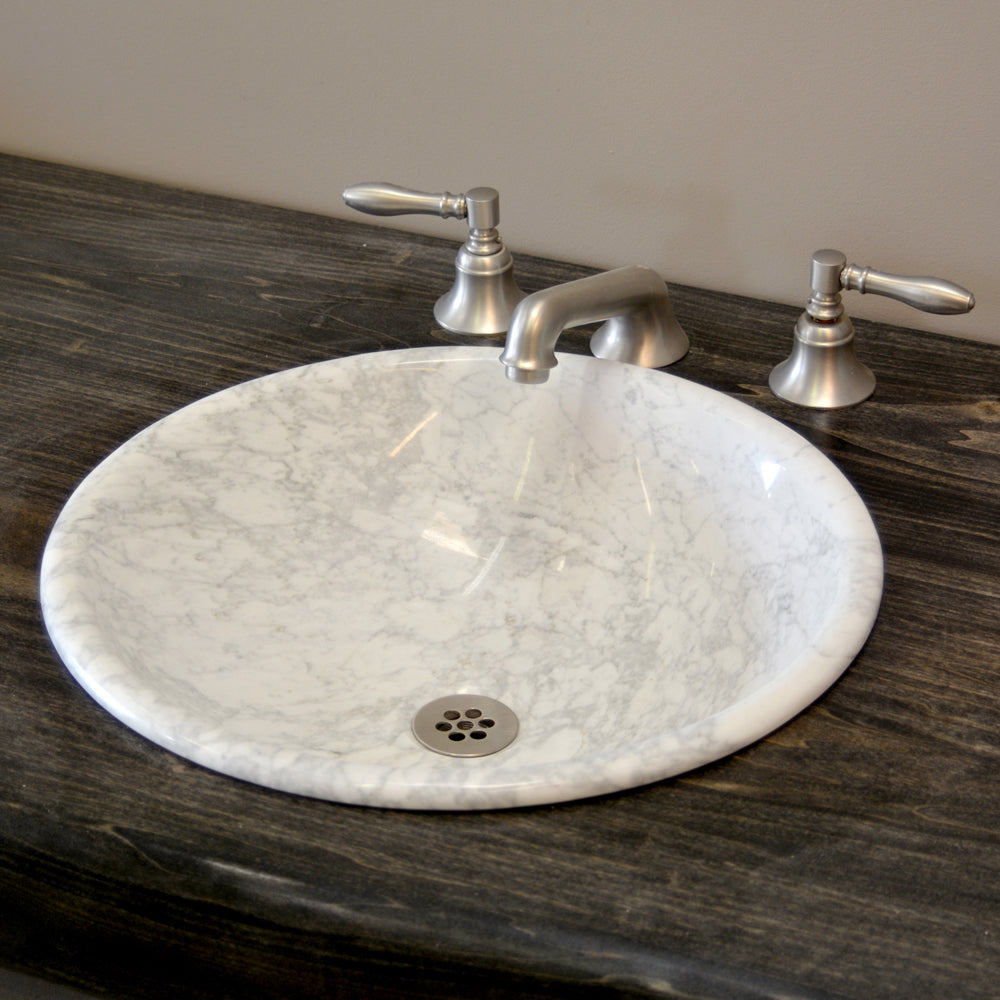 self-rimming lavatory sink in Carrara Marble