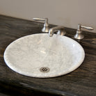 self-rimming lavatory sink in Carrara Marble
