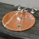 self-rimming lavatory sink in Rojo Alicante Marble