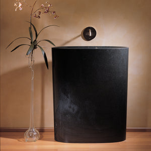 The Stone Forest Infinity Pedestal sink is carved from a single block of black granite image 3 of 5