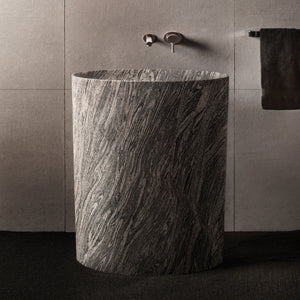 The Stone Forest Infinity Pedestal sink is carved from a single block of Cumulo Granite. image 5 of 5