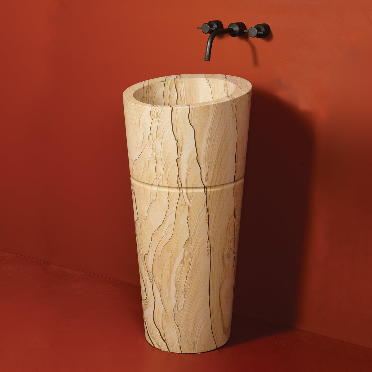 Stone Forest Veneto Pedestal Sink carved from a block of sandstone with a polished finish. image 1 of 7