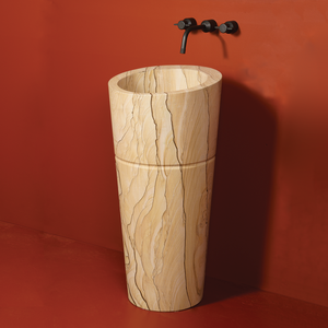 Stone Forest Veneto Pedestal Sink carved from a block of sandstone with a polished finish. image 1 of 7