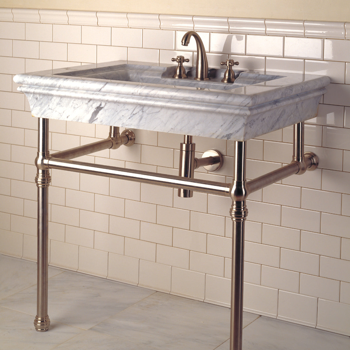 Bordeaux Vanity sink is carved from a solid block of carrara marble with a polished finish.  image 3 of 4