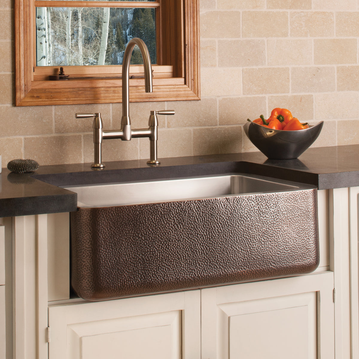 Farmhouse sink with stainless steel interior and hammered copper exterior image 3 of 4