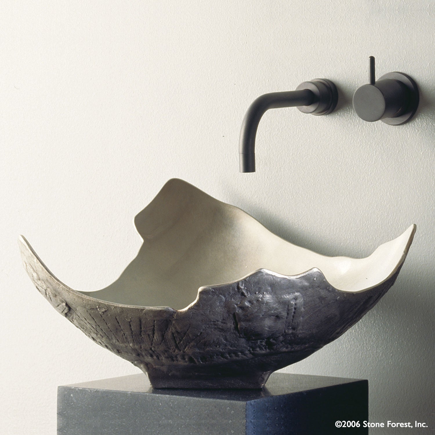 Chalice vessel sink in white bronze.  Exterior is darker in all finish options due to the design and texture.