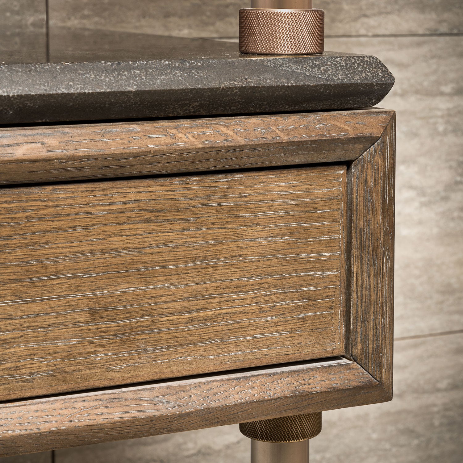 Detail of Cement gray drawer and antique gray limestone cap shelf with Elemental Classic fittings