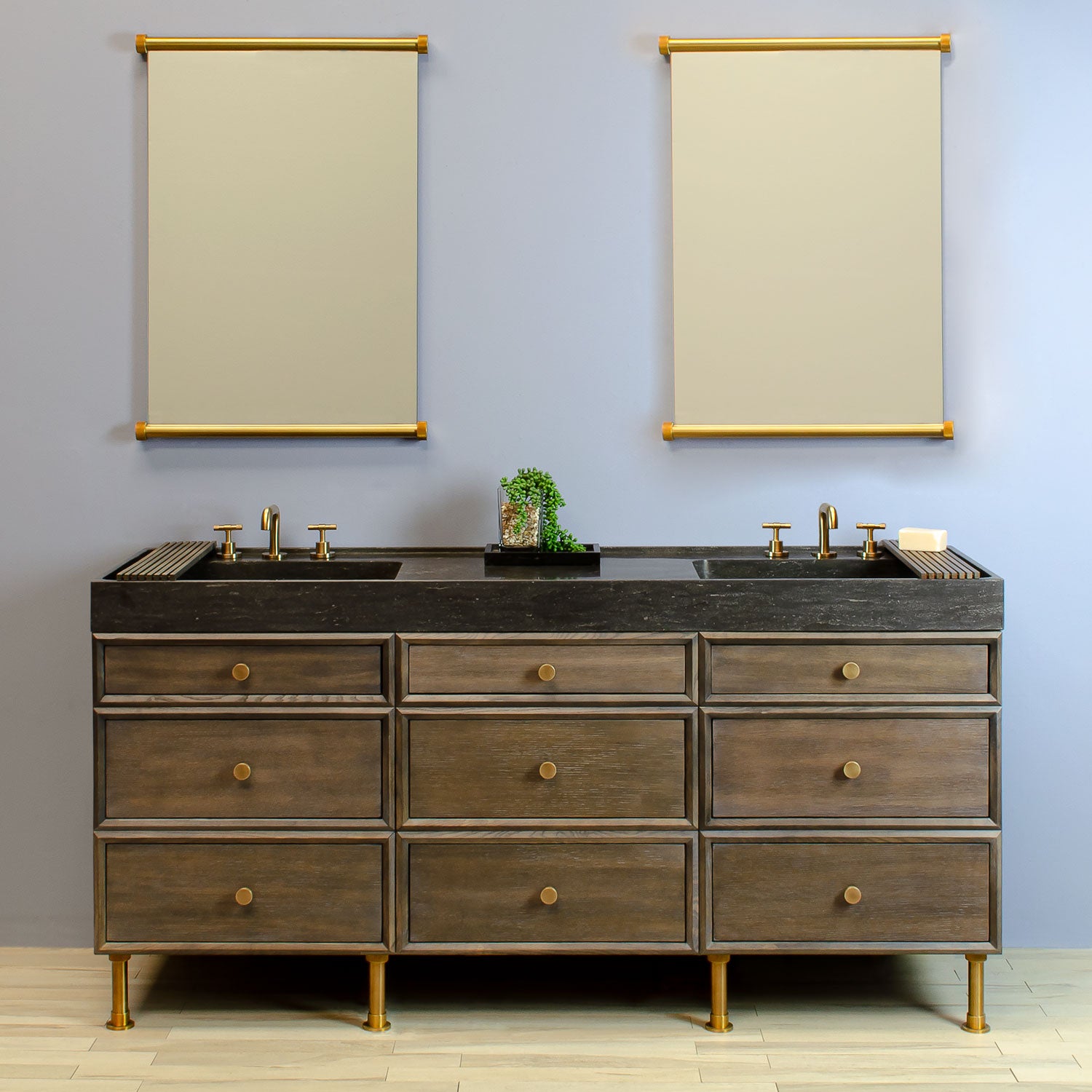 Custom Double Basin Ventus with Faucet Deck in antique gray limestone paired with Elemental Classic Vanity in aged brass with Triple Drawer Stacks