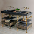 Custom Double Basin Ventus Sink with Faucet Deck in antique gray limestone paired with Elemental Classic Console Vanity in aged brass
