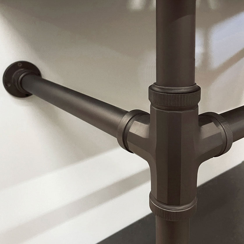 Detail of Stone Forest Elemental Facet fitting in matte bladk.