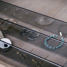 Stone Forest Elemental glass drawer dividers made of gray tempered glass