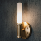 Elemental Facet Tee Sconce in aged brass