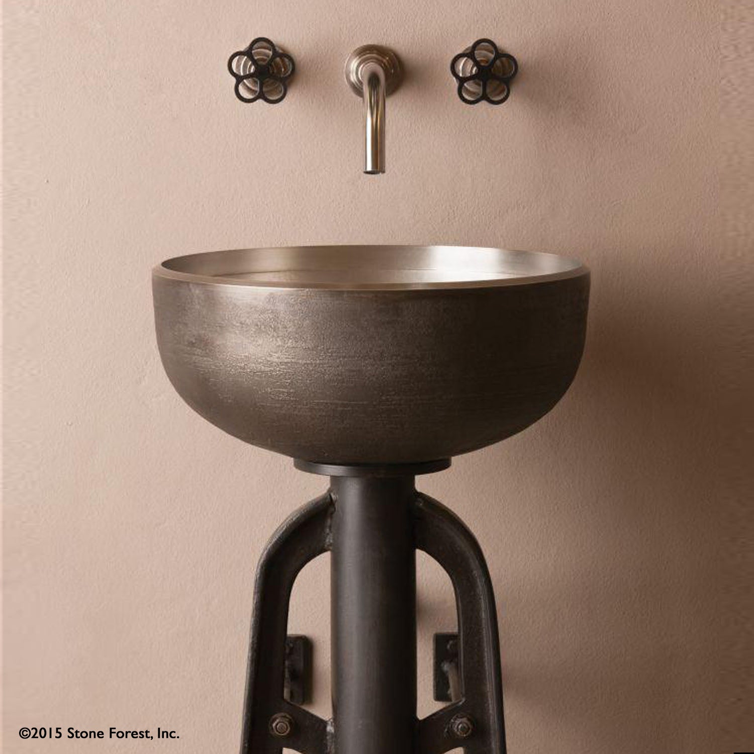The Stone Forest white bronze Ore Vessel Sink has a raw texture on the exterior created from the sand casting method, the inside has a smooth finish
