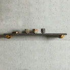 Elemental Classic Accessory Shelf in antique gray limestone and aged brass