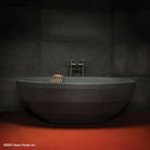 Facet Bathtub in noce basalt