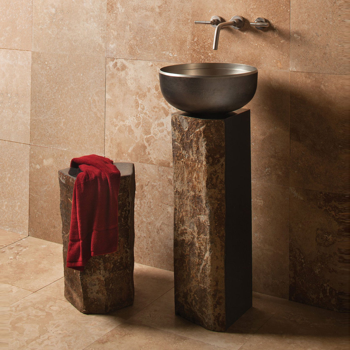 Stone Forest Basalt Pedestal cut from a solid column of natural basalt.  Each piece features polished sides with contrasting natural textures paired with a white bronze Ore Vessel sink. image 1 of 3