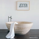 Round Bathtub in travertino romano