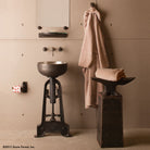 The Stone Forest white bronze Ore Vessel Sink has a raw texture on the exterior created from the sand casting method, the inside has a smooth finish