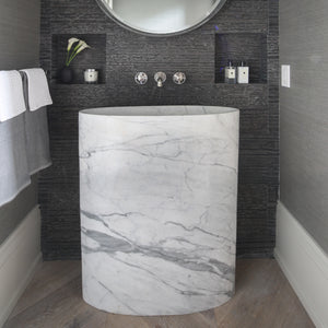 The Stone Forest Infinity Pedestal sink is carved from a single block of carrara marble image 2 of 5