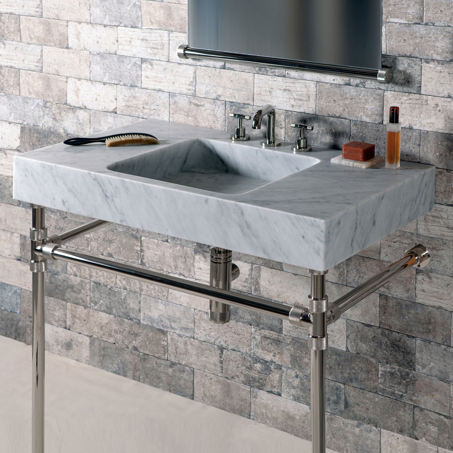 A carrera gray marble Terra bath sink with elemental classic legs with crossbar in polished nickel finish.