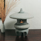 Stone Forest Yukimi lantern is carved from blue-gray granite. 
